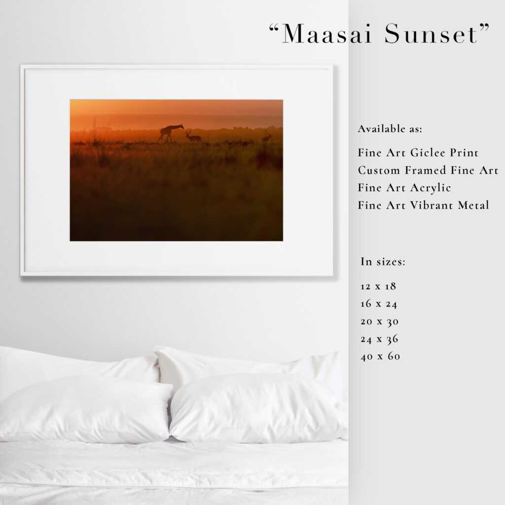 A captivating Maasai sunset with silhouetted figures and vibrant orange sky.